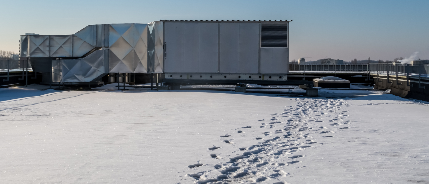 The Importance of Snow Load Management for Chicagoland Commercial Roofs